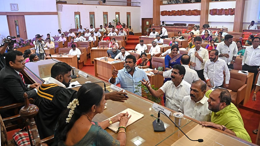 <div class="paragraphs"><p>Opposition leaders gather in front of Mayor's pedestal following chaos after 'political' remarks. </p></div>