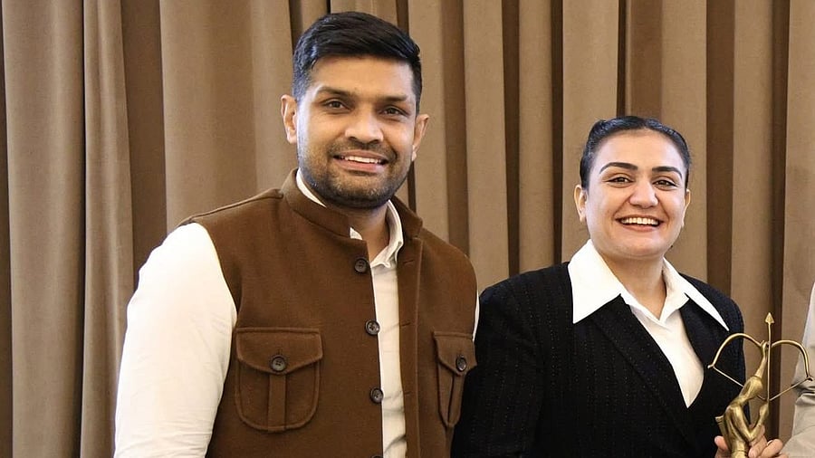 <div class="paragraphs"><p>Saweety Boora with husband Deepak Hooda</p></div>