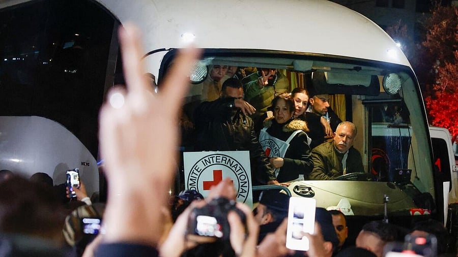 <div class="paragraphs"><p>People gather to greet freed Palestinian prisoners</p></div>