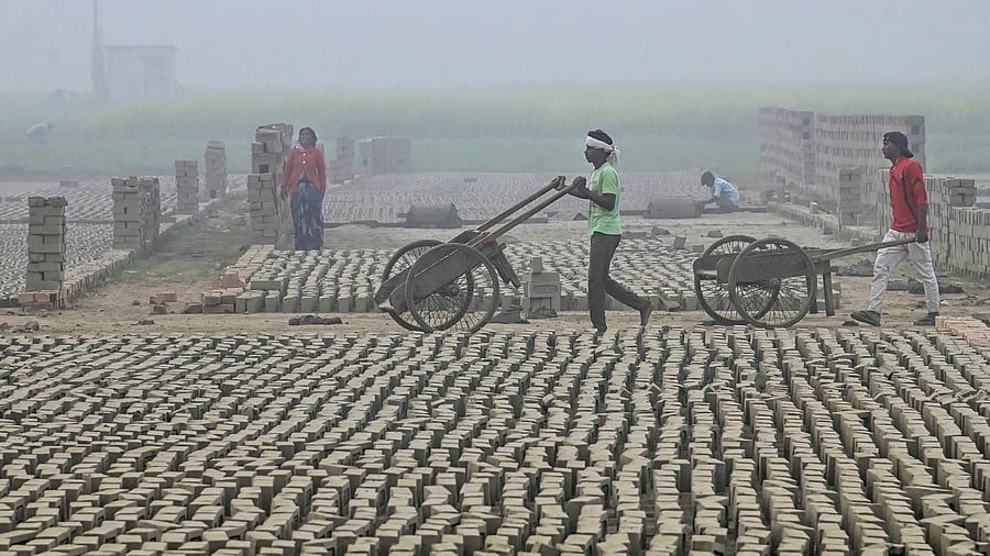 <div class="paragraphs"><p>Workers at a brick kiln. Representative image.</p></div>