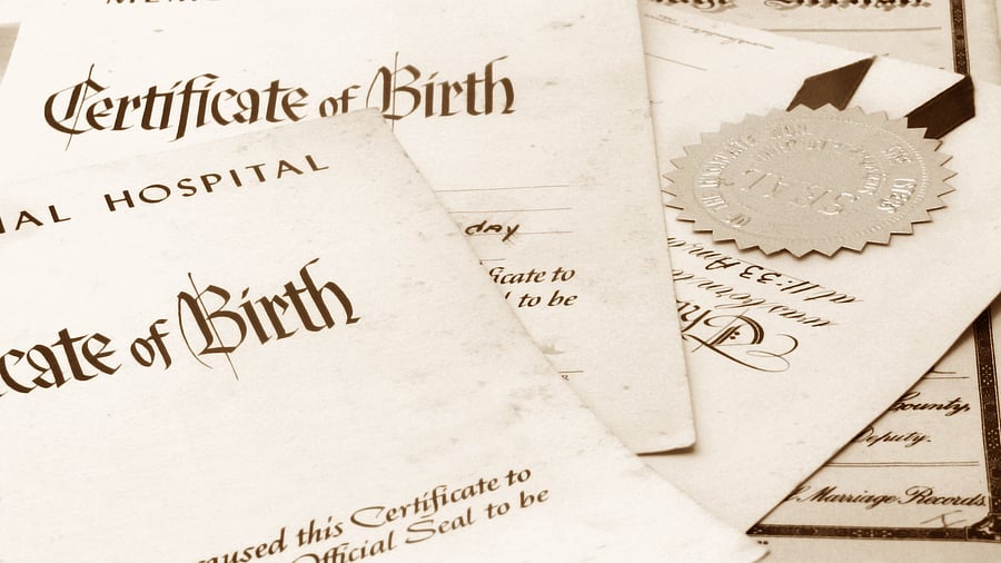 <div class="paragraphs"><p>Representative image showing birth certificate</p></div>