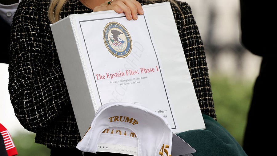 <div class="paragraphs"><p>People walk out of the West Wing of the White House with "The Epstein Files: Phase 1" binders, in Washington, DC, US, February 27, 2025. </p></div>
