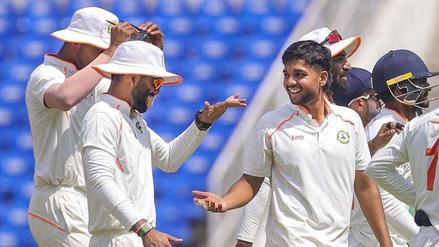 <div class="paragraphs"><p>Harsh Dubey celebrates with team-mates after taking the dismissing Kerala's Aditya Sarwate during the third day of the Ranji Trophy final in Nagpur.</p></div>
