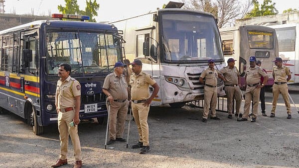 <div class="paragraphs"><p>Police personnel guard at the Swargate Bus Stand after the alleged rape of a 26-year-old woman inside a Maharashtra State Road Transport Corporation (MSRTC) bus, in Pune, on Thursday.</p></div>