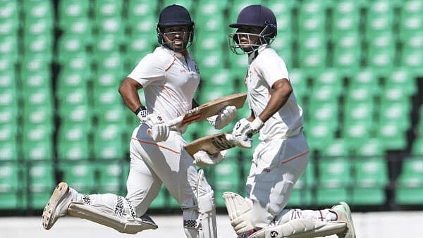 <div class="paragraphs"><p>Vidarbha's Karun Nair, left, and Danish Malewar run between the wickets on the first day of the Ranji Trophy final</p></div>