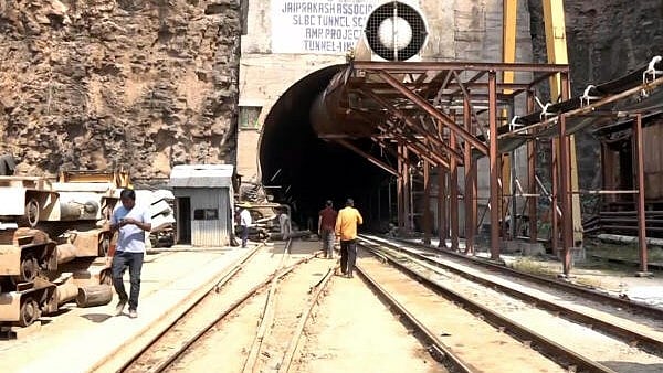 <div class="paragraphs"><p>Rescue operation underway to trace workers trapped inside the partially collapsed Telangana's Srisailam Left Bank Canal tunnel, in Nagarkurnool, Telangana.</p></div>