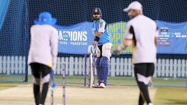 <div class="paragraphs"><p>Virat Kohli bats in the nets during a practice session ahead of a One Day International (ODI) cricket match of the ICC Champions Trophy between India and New Zealand, at ICC Academy Ground No 2 , in Dubai</p></div>
