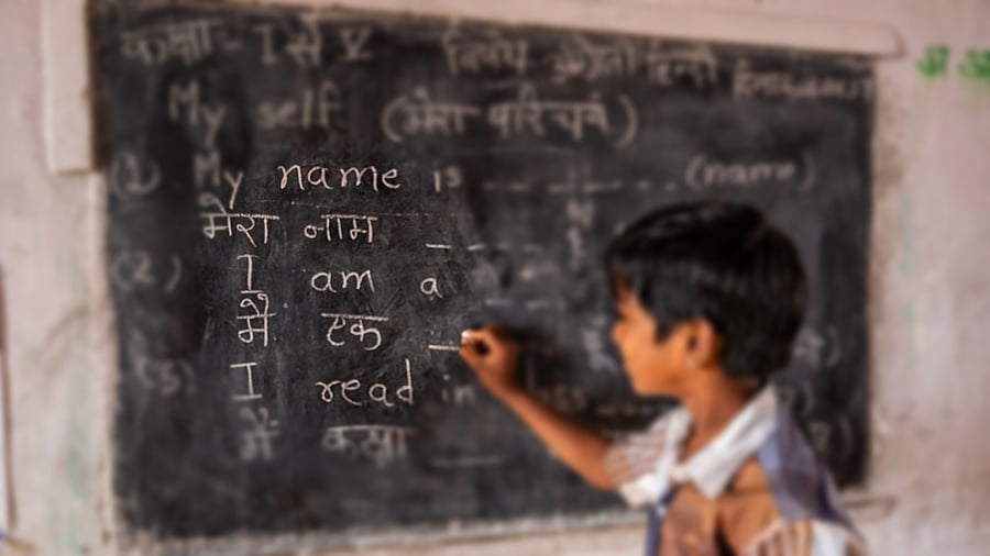 <div class="paragraphs"><p>A schoolboy is seen learning to write in Hindi in this representative image</p></div>
