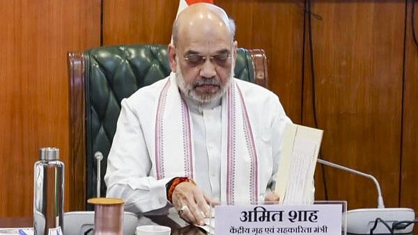 <div class="paragraphs"><p>Union Home Minister Amit Shah chairs a meeting to review security situation in Manipur, in New Delhi, Saturday, March 1</p></div>