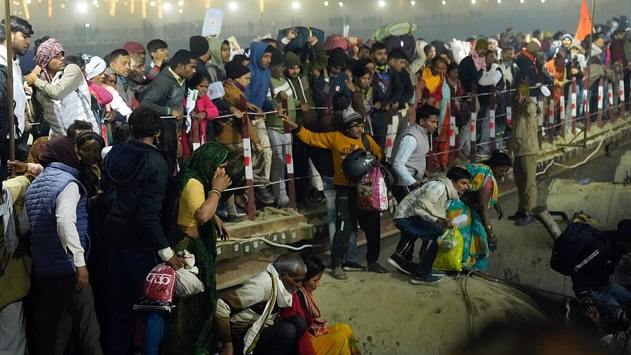 <div class="paragraphs"><p>Devotees are seen after a stampede occurred at Sangam on 'Mauni Amavasya' during the ongoing 'Maha Kumbh Mela' festival, in Prayagraj.</p></div>