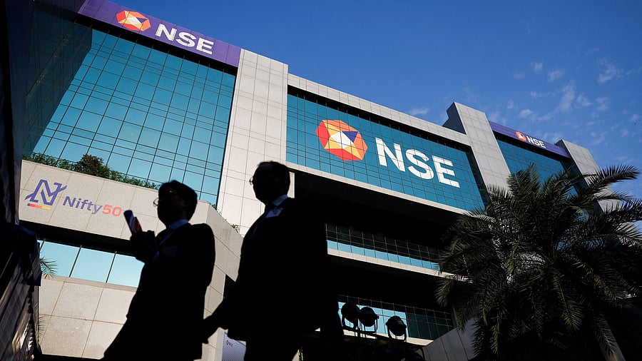 <div class="paragraphs"><p>People walk outside the National Stock Exchange (NSE) in Mumbai, India, October 22, 2024. </p></div>