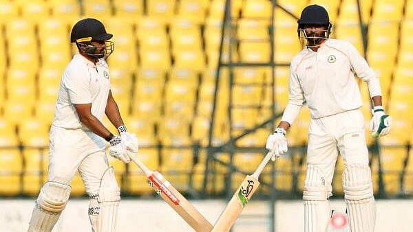 <div class="paragraphs"><p>Vidarbha's batters Karun Nair and Akshay Wadkar during the fourth day of the Ranji Trophy 2024-25 final cricket match between Kerala and Vidarbha, at Vidarbha Cricket Association (VCA) Stadium, in Nagpur.</p></div>