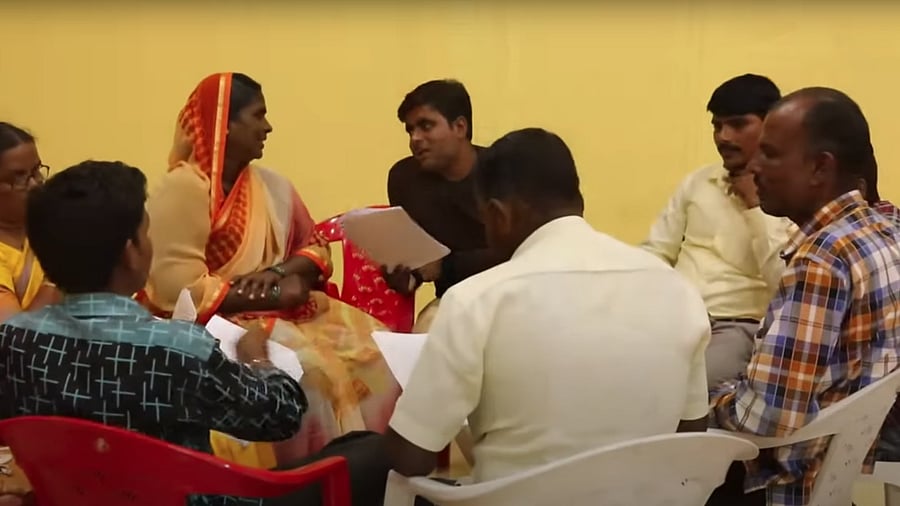 <div class="paragraphs"><p>Group discussion before the Devadasi bill-drafting process.</p></div>