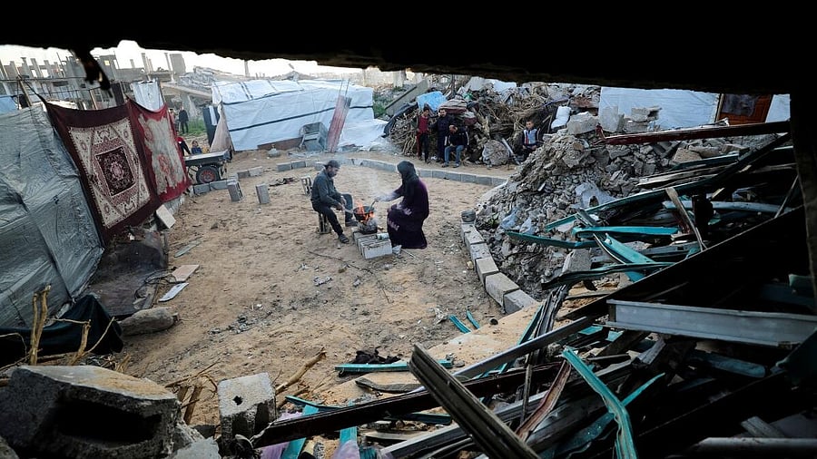 <div class="paragraphs"><p>Palestinian family prepares Iftar meals during the holy month of Ramadan, in Jabalia.</p></div>
