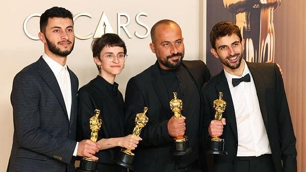 <div class="paragraphs"><p>Basel Adra, Rachel Szor, Hamdan Ballal and Yuval Abraham pose with the Oscar for Best Documentary Feature Film for "No Other Land" in the Oscars photo room at the 97th Academy Awards in Hollywood, Los Angeles, California, U.S., March 2, 2025.</p></div>