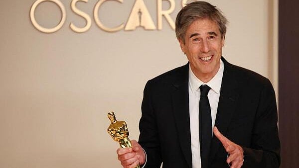 <div class="paragraphs"><p>Director Walter Salles poses with the Oscar for Best International Feature Film for "I'm Still Here" of Brazil in the Oscars photo room at the 97th Academy Awards in Hollywood, Los Angeles, California, US</p></div>