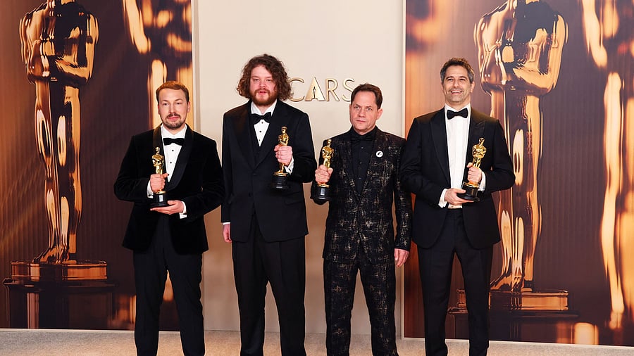 <div class="paragraphs"><p>Gints Zilbalodis, Matiss Kaza, Ron Dyens and Gregory Zalcman pose with the Oscar for Best Animated Feature Film for Flow in the Oscars photo room at the 97th Academy Awards in Hollywood, Los Angeles, California, March 2, 2025.</p></div>