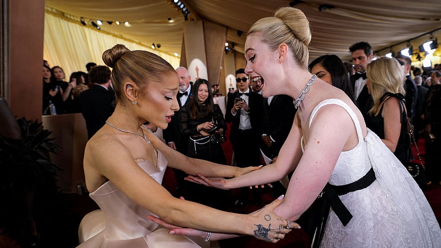 <div class="paragraphs"><p>Elle Fanning greets Ariana Grande on the red carpet during the Oscars arrivals at the 97th Academy Awards in Hollywood, Los Angeles, California, March 2, 2025.</p></div>