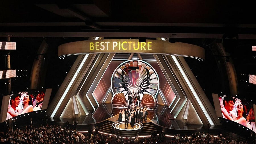 <div class="paragraphs"><p>Producers Alex Coco and Samantha Quan, and director Sean Baker win the Oscar for Best Picture for "Anora" during the Oscars show at the 97th Academy Awards in Hollywood, Los Angeles, California, US, March 2, 2025.</p></div>