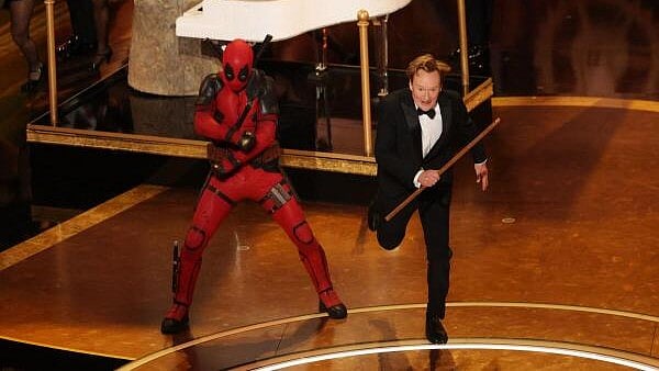 <div class="paragraphs"><p>Conan O' Brien performs during the Oscars show at the 97th Academy Awards in Hollywood, Los Angeles, California, US, March 2, 2025.</p></div>