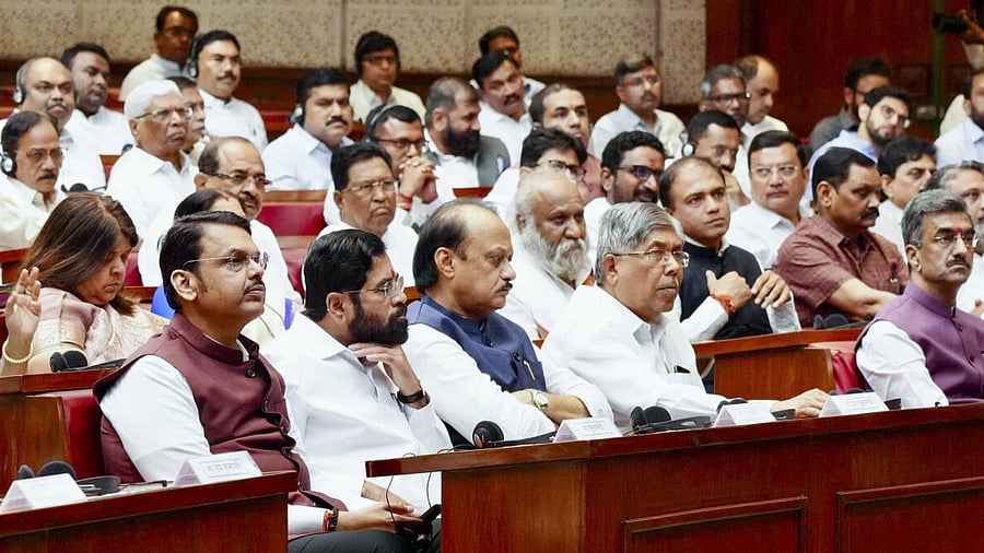 <div class="paragraphs"><p>Maharashtra Chief Minister Devendra Fadnavis with Deputy CMs Eknath Shinde and Ajit Pawar, and others attend a joint session on the first day of the state Assembly's Budget session, in Mumbai. </p></div>