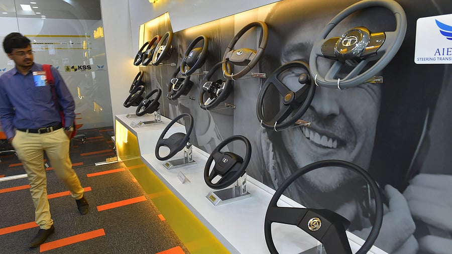 <div class="paragraphs"><p>New Delhi: A visitor views steering-wheels at a stall at the Auto Expo Component 2018 that began at Pragati Maidan in New Delhi on Thursday.  </p></div>