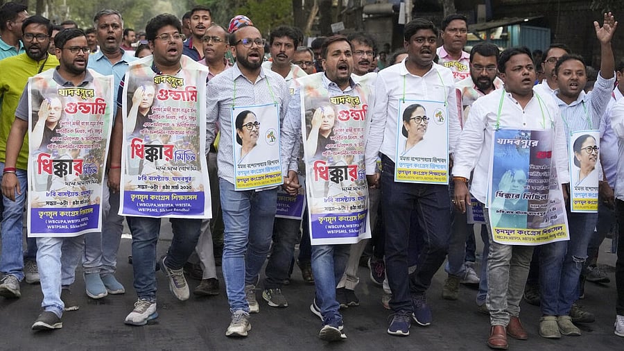 <div class="paragraphs"><p>West Bengal College & University Professors Association (WBCUPA) members participate in a rally to protest against the alleged attack on state Education Minister Bratya Basu, near Jadavpur University in Kolkata, Tuesday, March 4, 2025.</p></div>
