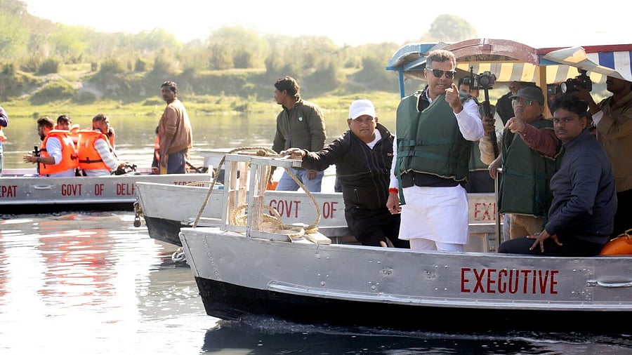 <div class="paragraphs"><p>Delhi Minister Parvesh Sahib Singh Verma takes a boat ride during inspection of the cleanliness efforts at Yamuna ghats, in New Delhi, Wednesday, March 5, 2025.</p></div>