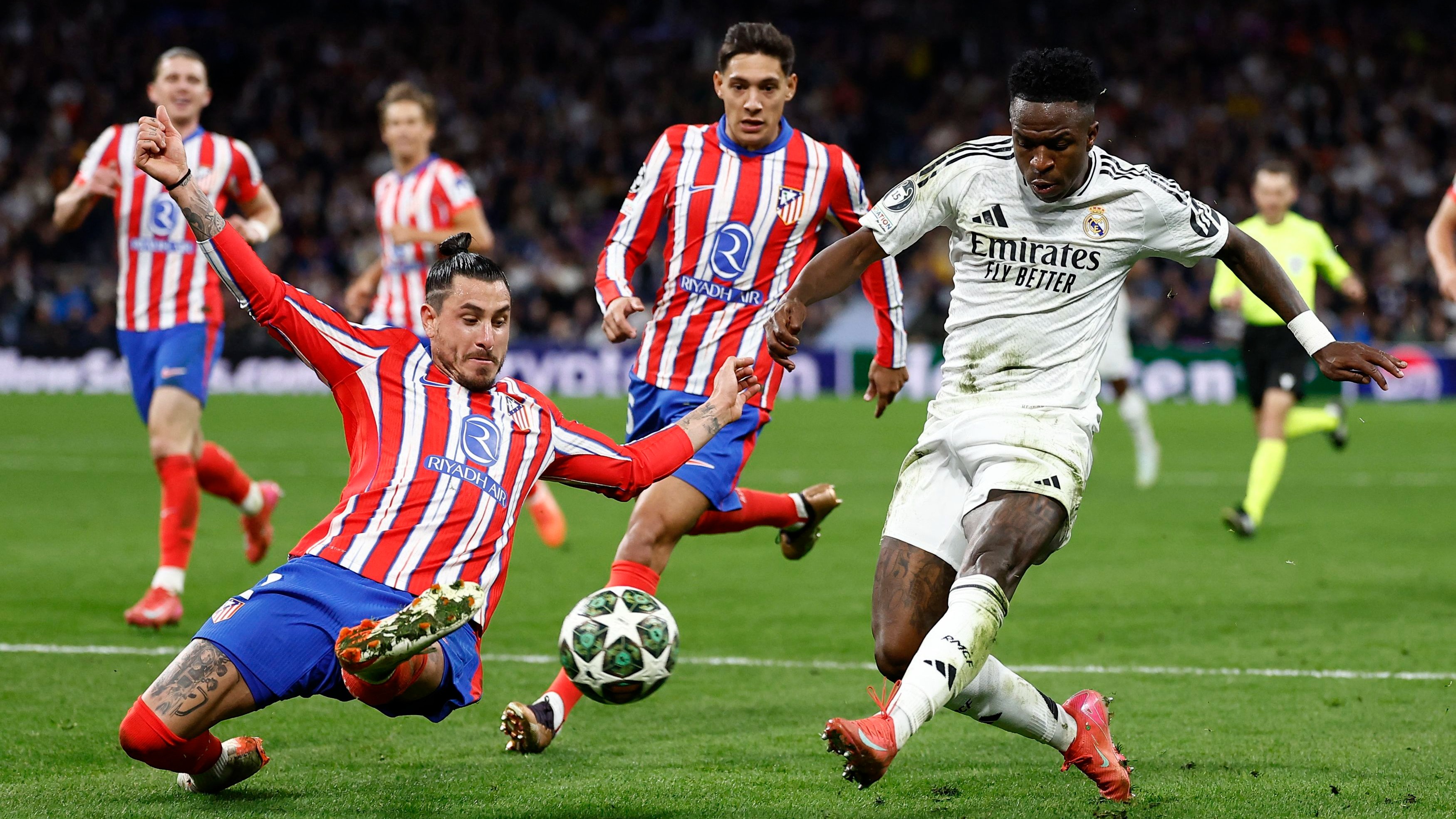 <div class="paragraphs"><p> Atletico Madrid's Jose Maria Gimenez in action against Real Madrid's Vinicius Junior.</p></div>