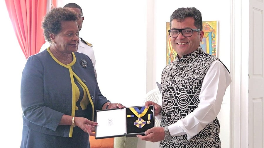 <div class="paragraphs"><p>Minister of State for External Affairs and Textiles, Pabitra Margherita, recieves the award on behalf of PM Modi.</p></div>