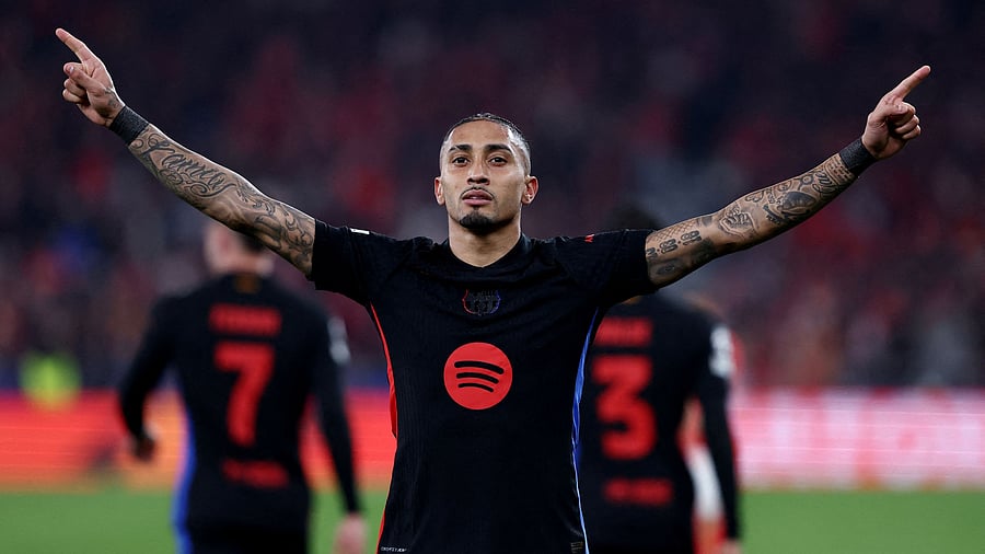 <div class="paragraphs"><p>Raphinha celebrates scoring Barcelona's goal.</p></div>