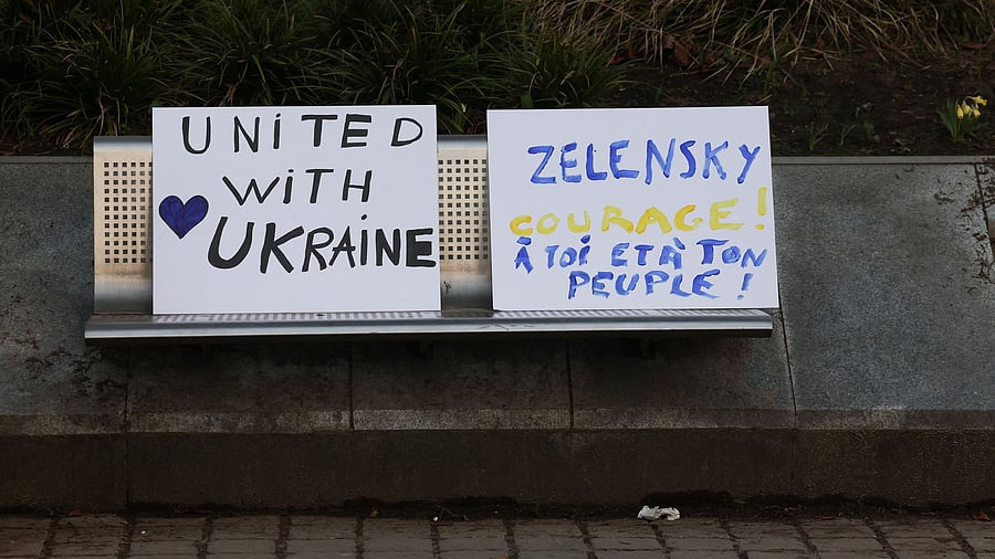 <div class="paragraphs"><p>Placards are placed on a bench on the day Ukrainian activists urge European leaders to seize frozen Russian assets to fund Ukraine in its conflict against Russia, in Brussels Belgium, March 5, 2025.</p></div>