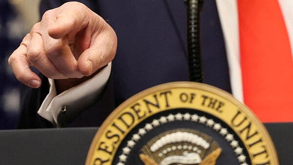 <div class="paragraphs"><p>US President Donald Trump gestures during a press conference in the Roosevelt Room at the White House in Washington</p></div>
