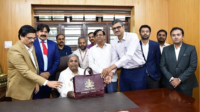 <div class="paragraphs"><p>CM Siddaramaiah with finance department officials . The 2025-26 Budget, which he is scheduled to present at 10.15 am.</p></div>