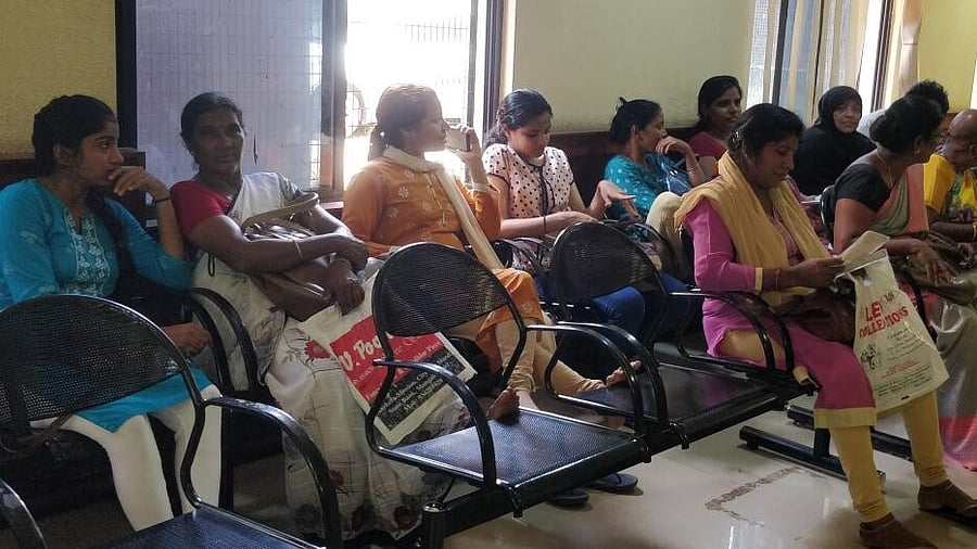 <div class="paragraphs"><p>A file image of women waiting for their turn to submit applications under Gruha Lakshmi scheme.&nbsp;</p></div>
