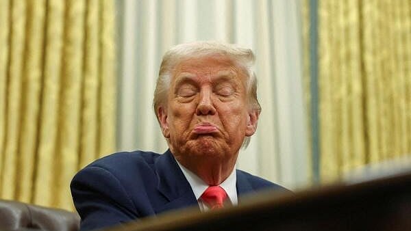 <div class="paragraphs"><p>US President Donald Trump reacts in the Oval Office, at the White House in Washington.&nbsp;</p></div>