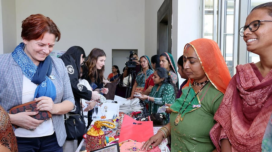 <div class="paragraphs"><p>Women ambassadors from nine nations pose for group photos during their visit to the Adani Group’s projects ahead of the International Women’s Day, in the Kutch district of Gujarat.</p></div>