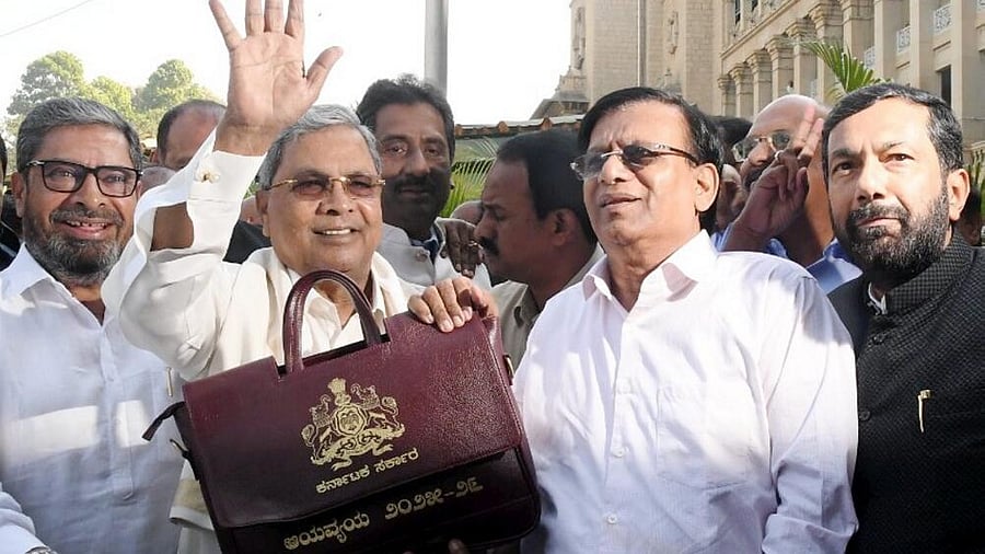 <div class="paragraphs"><p>Karnataka CM Siddaramaiah with the state budget document.</p></div>