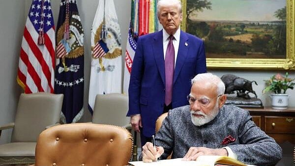 <div class="paragraphs"><p>Narendra Modi during a meeting with Donald Trump</p></div>