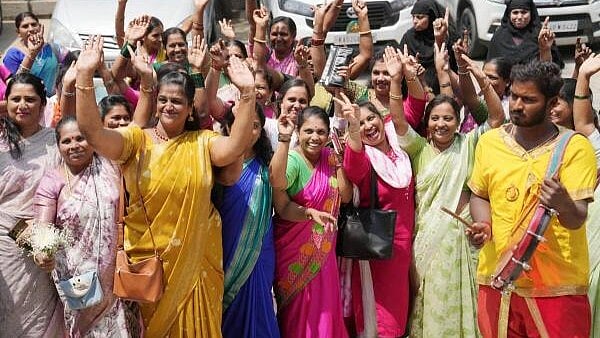 <div class="paragraphs"><p>Women celebrating the International Women's Day.</p></div>