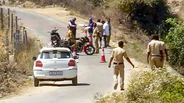 <div class="paragraphs"><p>Police personnel conduct an investigation after two women, including a foreign national, were allegedly raped near the Hampi heritage site, on Saturday.</p></div>