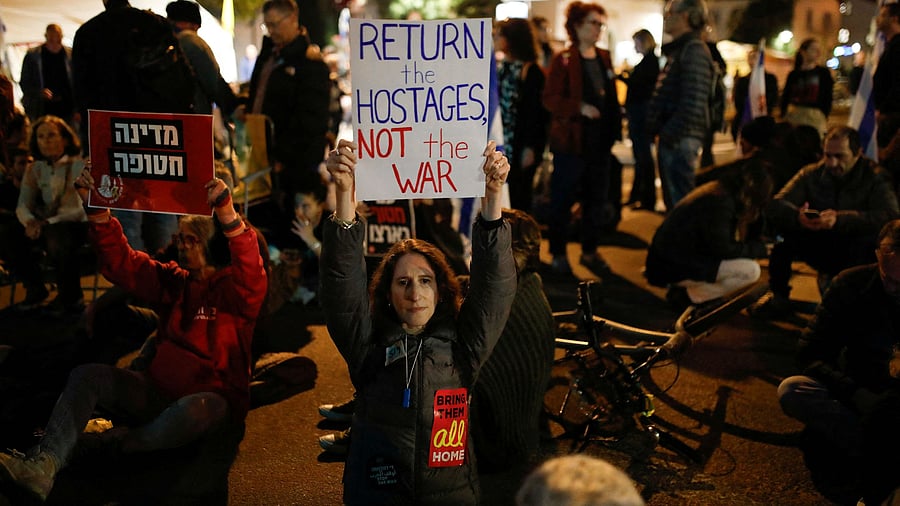 <div class="paragraphs"><p>Relatives and supporters of Israeli hostages kidnapped during the deadly October 7, 2023, attack on Israel by Hamas block one of the entrances to Israel's Ministry of Defense during a protest demanding the release of all hostages, in Tel Aviv, Israel March 8, 2025. </p></div>