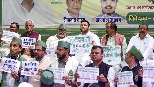 <div class="paragraphs"><p>Leader of Opposition in Bihar Assembly Tejashwi Yadav with party senior RJD leaders stages a 'dharna' against the state government, in Patna, Sunday, March 9, 2025.</p></div>