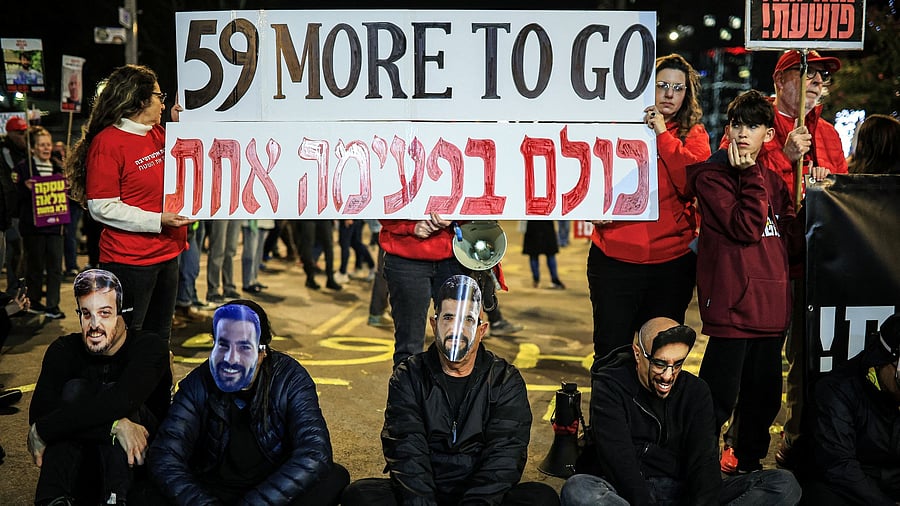 <div class="paragraphs"><p>Protest to demand release of all Israeli hostages kidnapped during October 7, 2023, attack by Hamas, in Tel Aviv, Israel, March 1, 2025.</p></div>