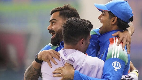 <div class="paragraphs"><p>India's Virat Kohli with teammates celebrate after their win against New Zealand in the ICC Champions Trophy 2025 final cricket match, in Dubai, UAE, Sunday, March 9, 2025. India won by 4 wickets to lift the ICC Champions Trophy 2025.</p></div>
