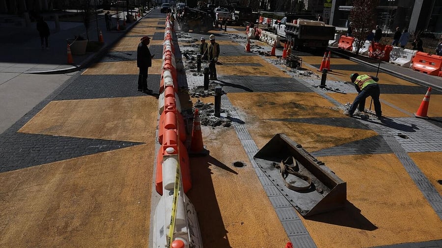 <div class="paragraphs"><p>People work to transform Washington DC's Black Lives Matter Plaza, as part of a new mural project.</p></div>