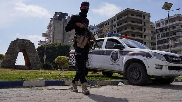 <div class="paragraphs"><p>A member of the Syrian security forces secures an area, after hundreds were killed in some of the deadliest violence in 13 years of civil war, pitting loyalists of deposed President Bashar al-Assad against the country's new Islamist rulers in Latakia, Syria March 9, 2025.</p></div>