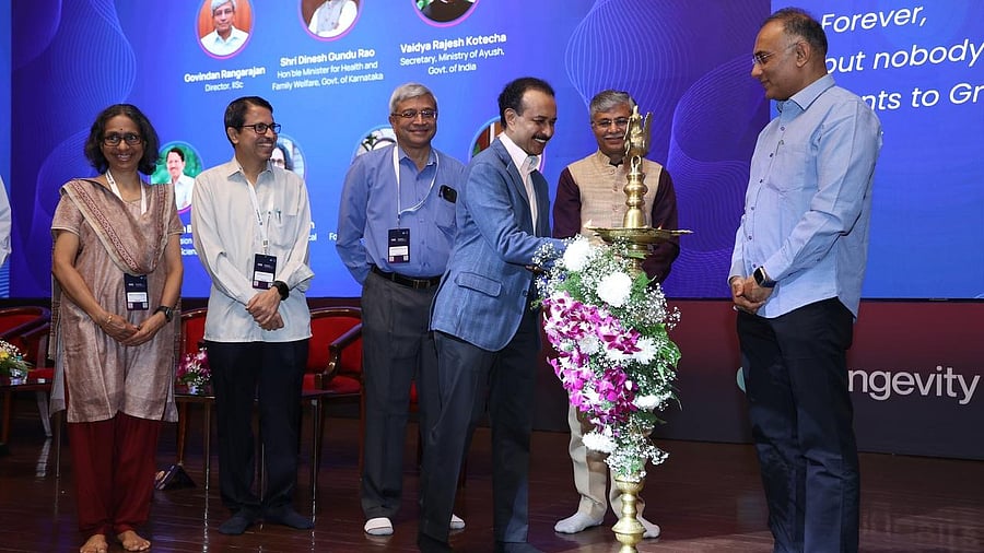 <div class="paragraphs"><p>Health Minister Dinesh Gundu Rao (extreme right) at the inauguration of the 'Longevity India Conference 2025' at the JN Tata Auditorium, IISc, on Monday. </p></div>