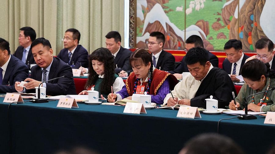 <div class="paragraphs"><p>Delegates attend a Tibet delegation group meeting at the Great Hall of the People during the National People's Congress (NPC) in Beijing recently.&nbsp;</p></div>