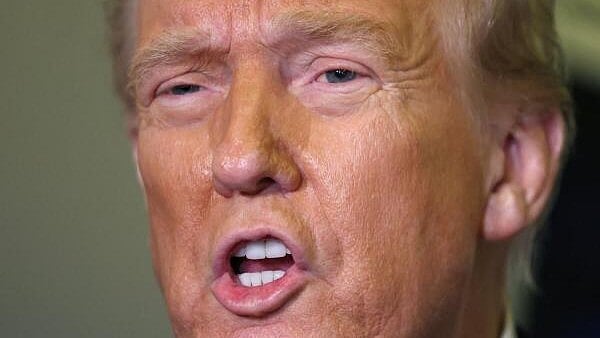 <div class="paragraphs"><p>U.S. President Donald Trump speaks to reporters aboard Air Force One on his return to Washington, D.C., U.S., March 9, 2025.</p></div>